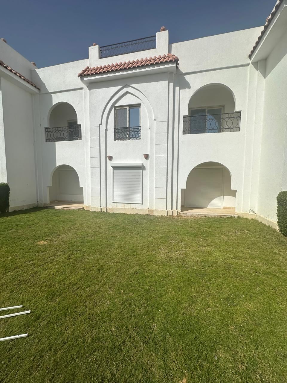 Garden-level shutters on a residential building