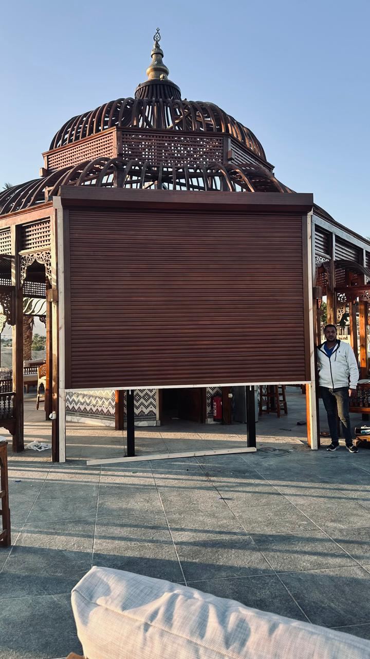 Wood-finish shutter on a resort structure
